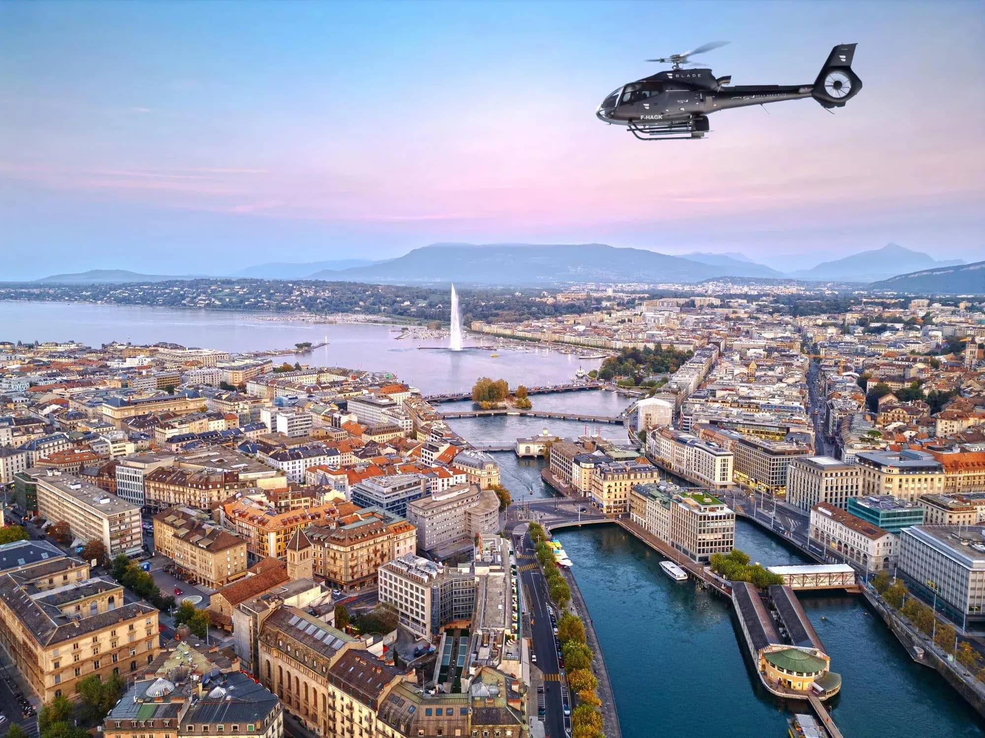H130 Héli Sécurité survolant Genève
